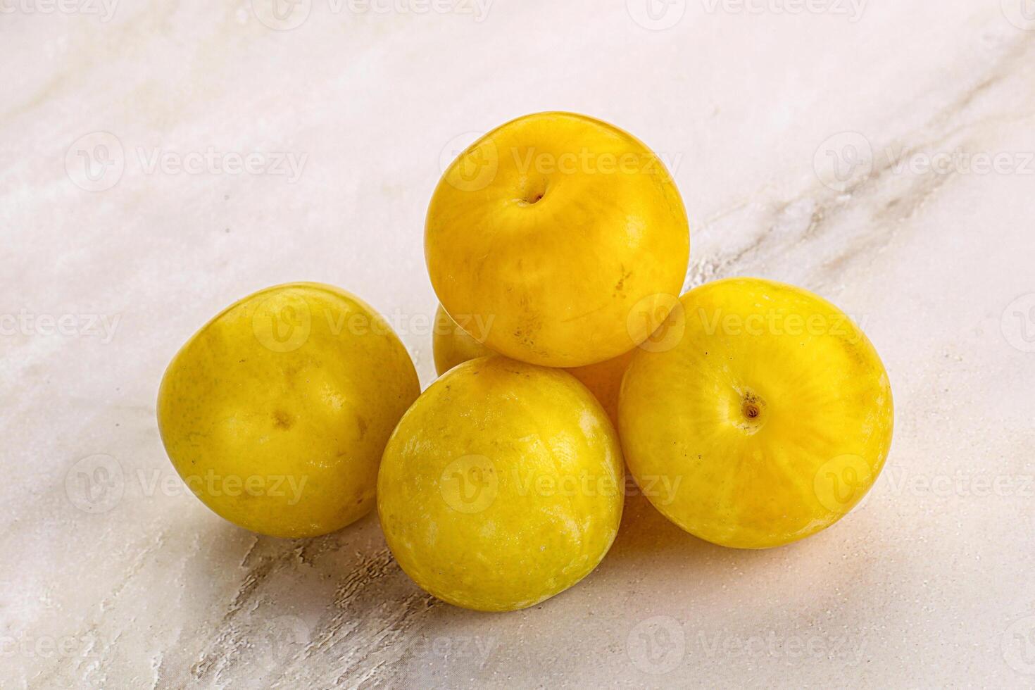 Yellow sweet plum heap fruit photo