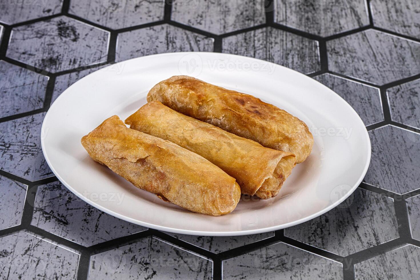 Traditional crispy fried stuffed springroll photo