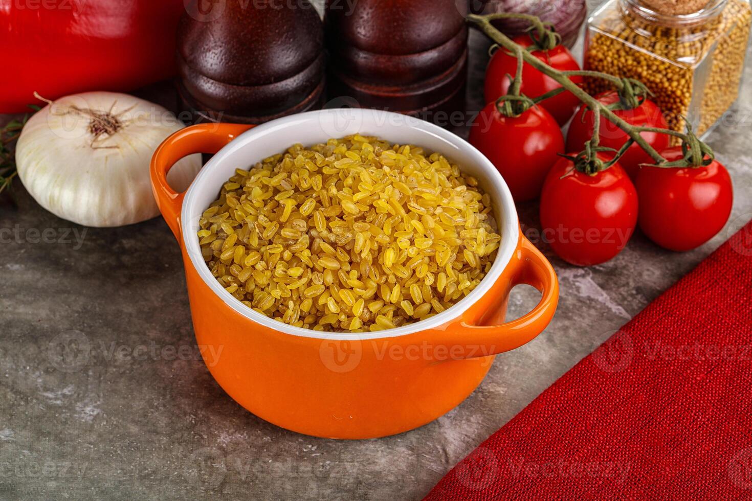 Dry wheat bulgur cereal heap photo