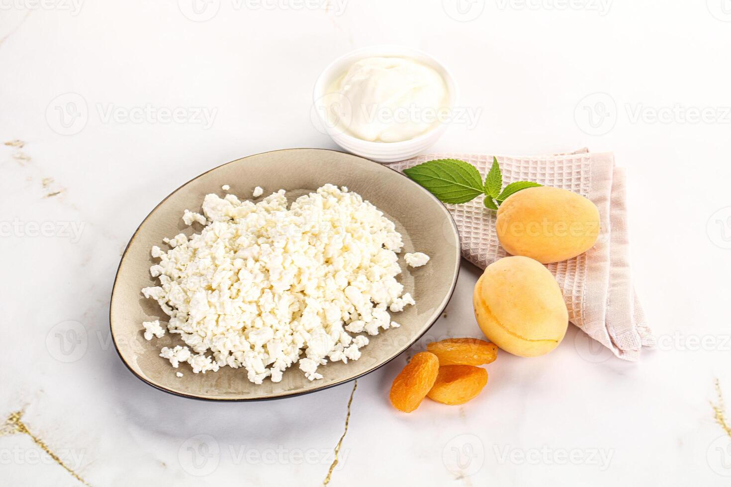 Cottage cheese with apricot and cream photo