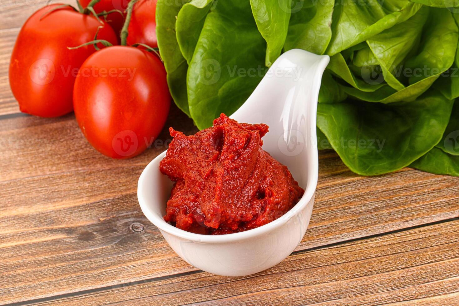 Tomato puree sauce for cooking photo