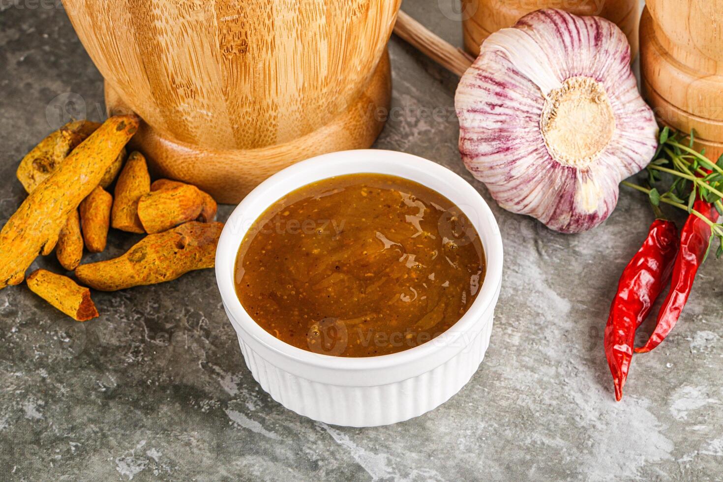 Indian curry sauce in the bowl photo