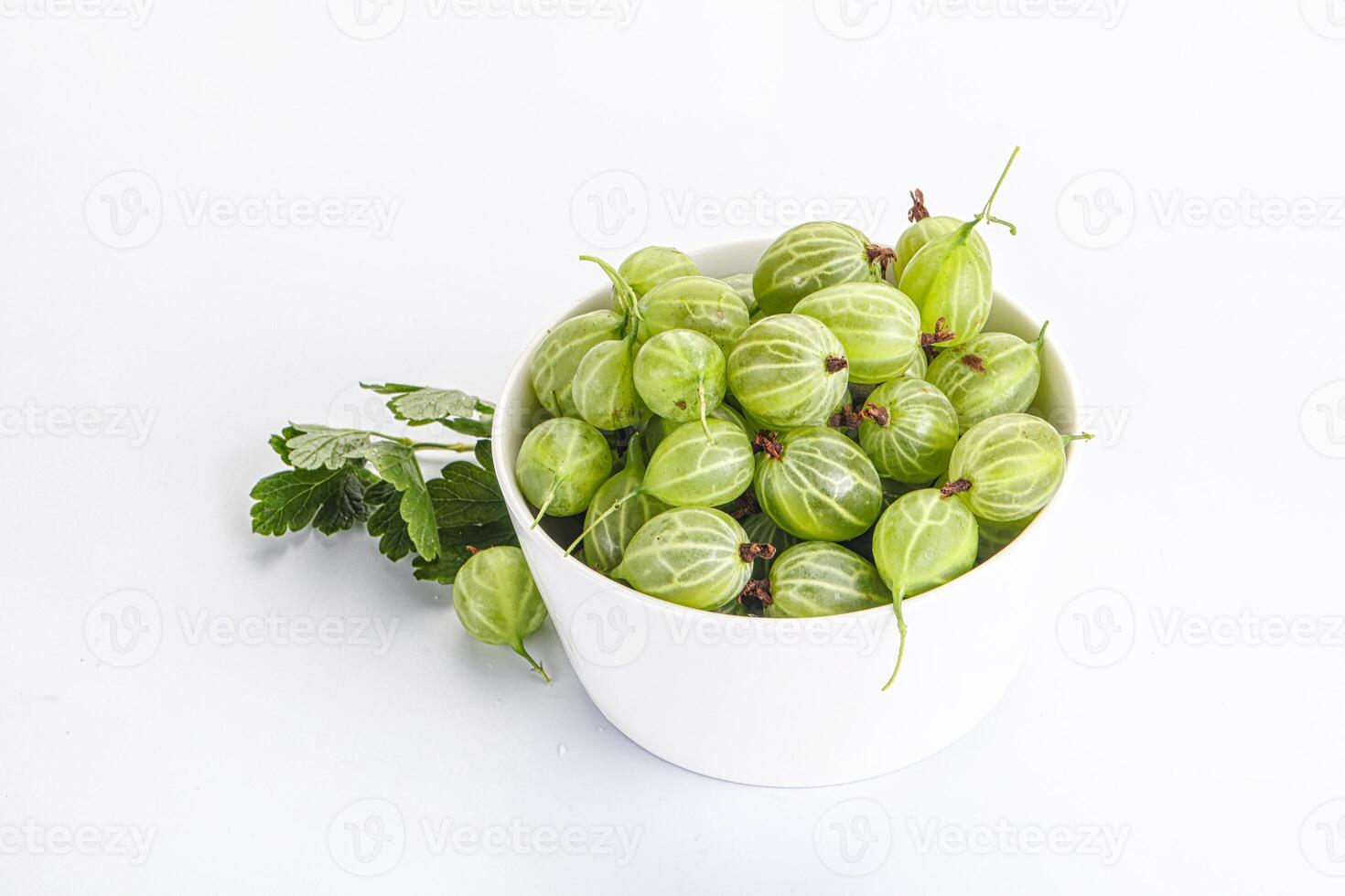 Sweet ripe gooseberries in the bowl photo