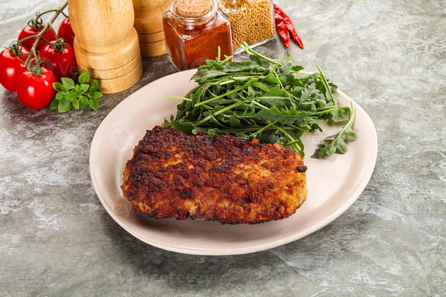 Tasty roasted breaded meat schnitzel photo