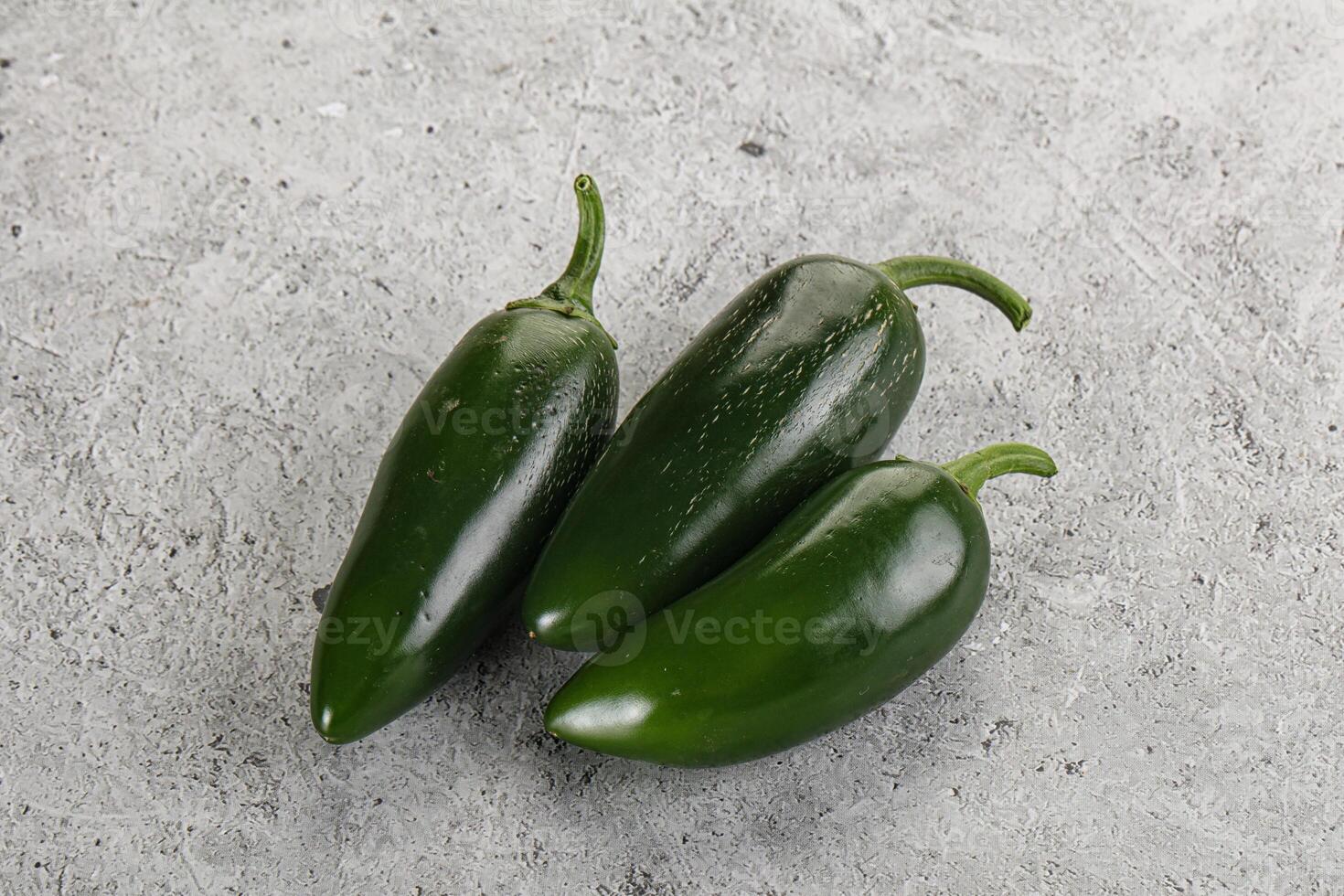 Raw green Mexican jalapeno pepper photo