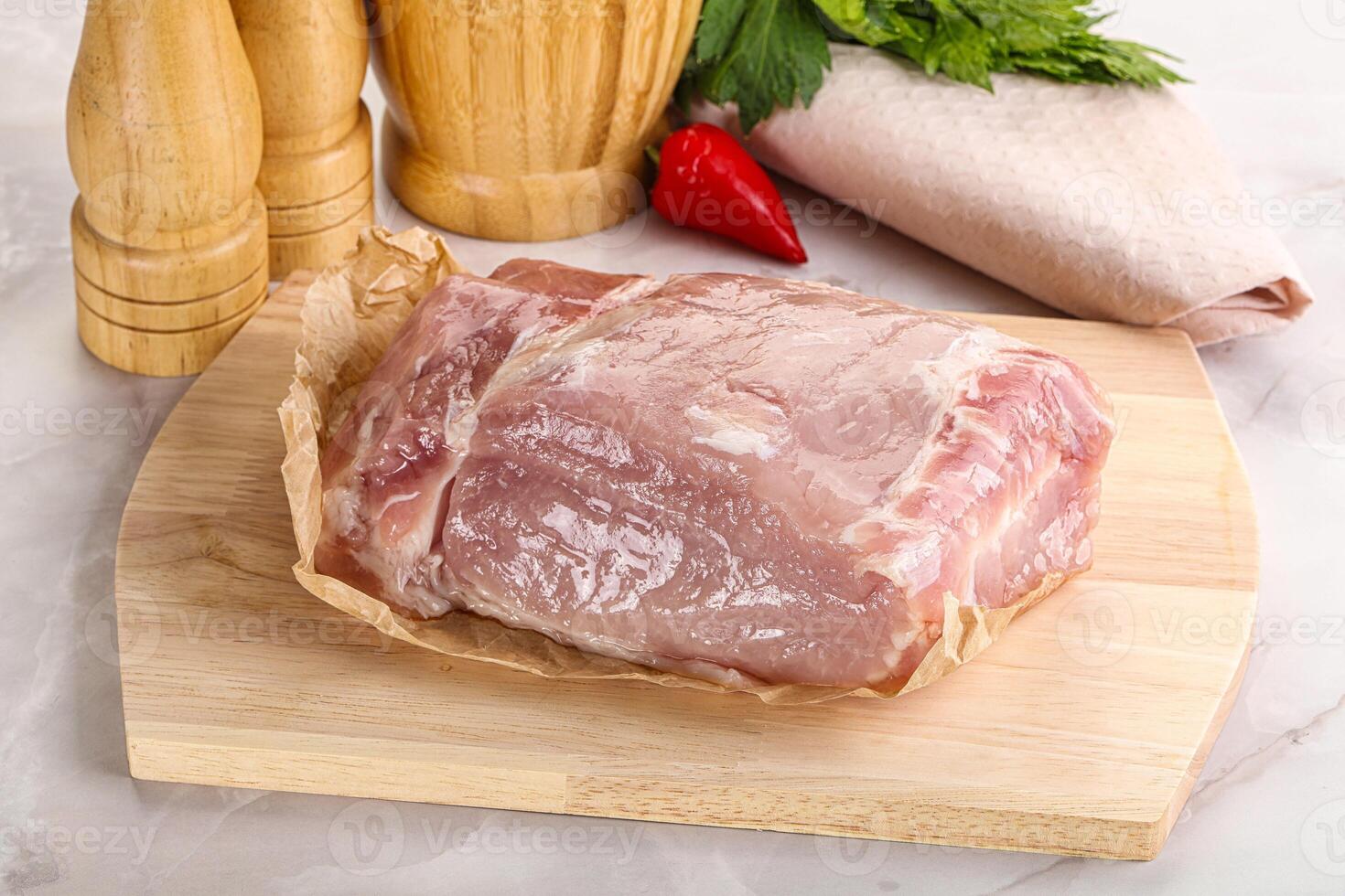 Raw uncooked pork meat loin photo