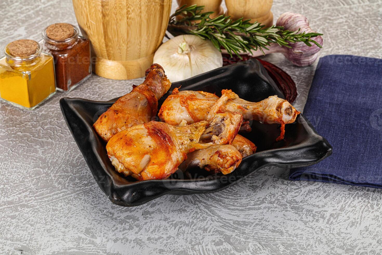 Raw marinated chicken drumstick for cooking photo