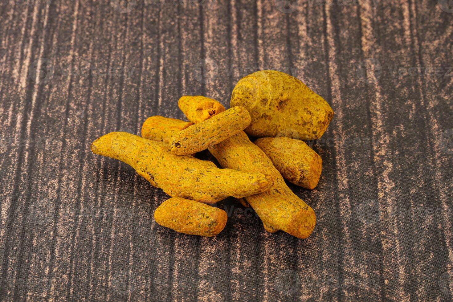Indian spices - Turmeric root Curcuma photo