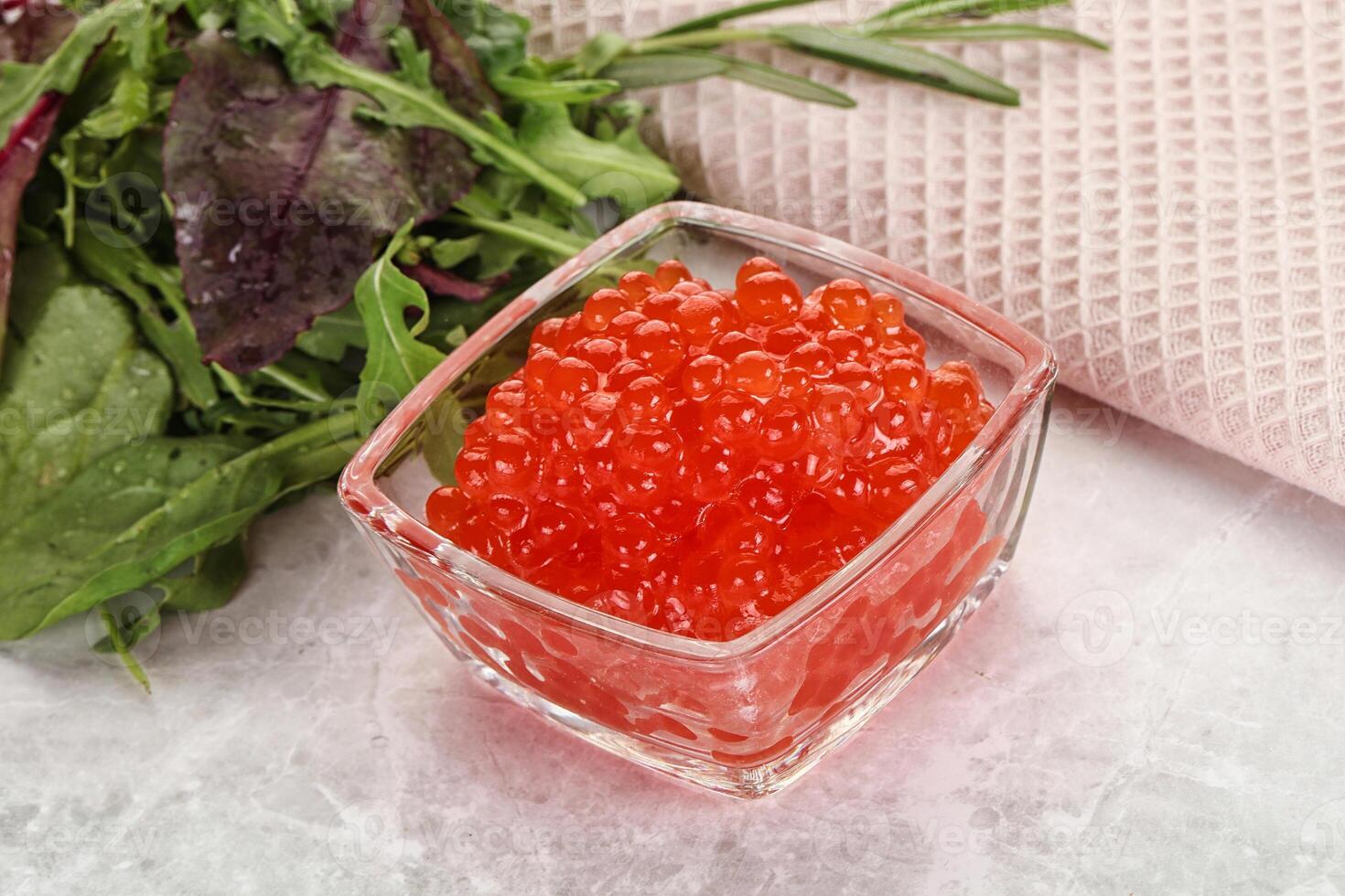 Red caviar in the bowl photo