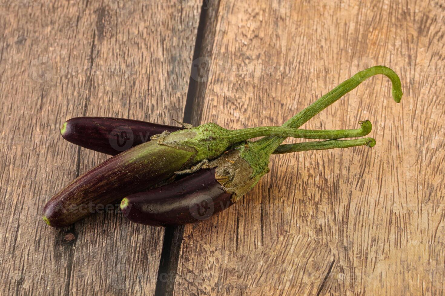 Baby organic purple eggplant heap photo