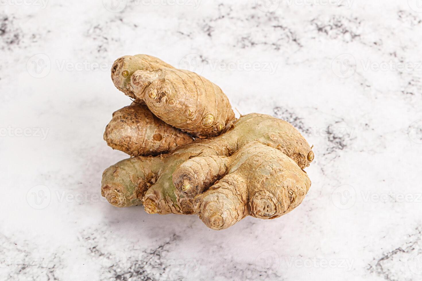 Raw ginger root fot cooking photo