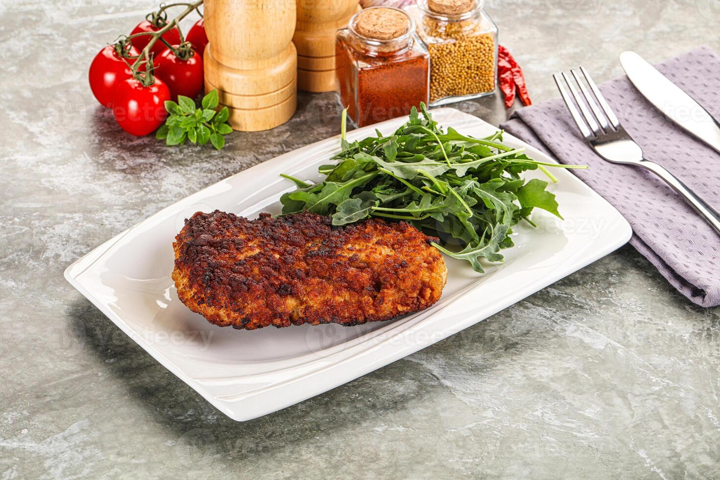 Tasty roasted breaded meat schnitzel photo