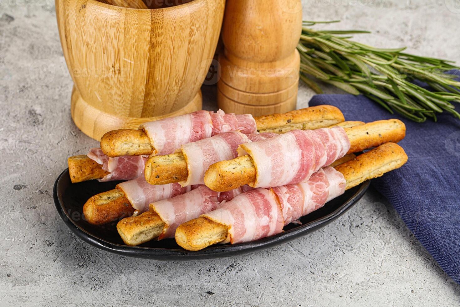Crispy grissini italian bread with bacon photo