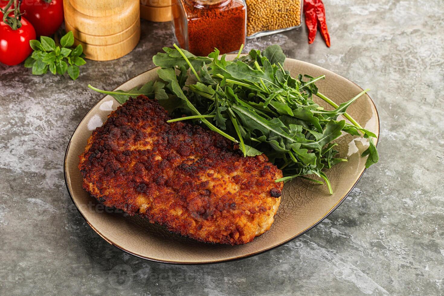 Tasty roasted breaded meat schnitzel photo