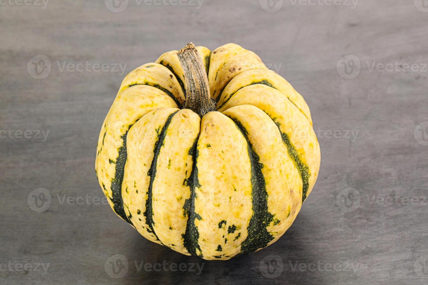 Ripe raw fresh decorative pumpkin photo