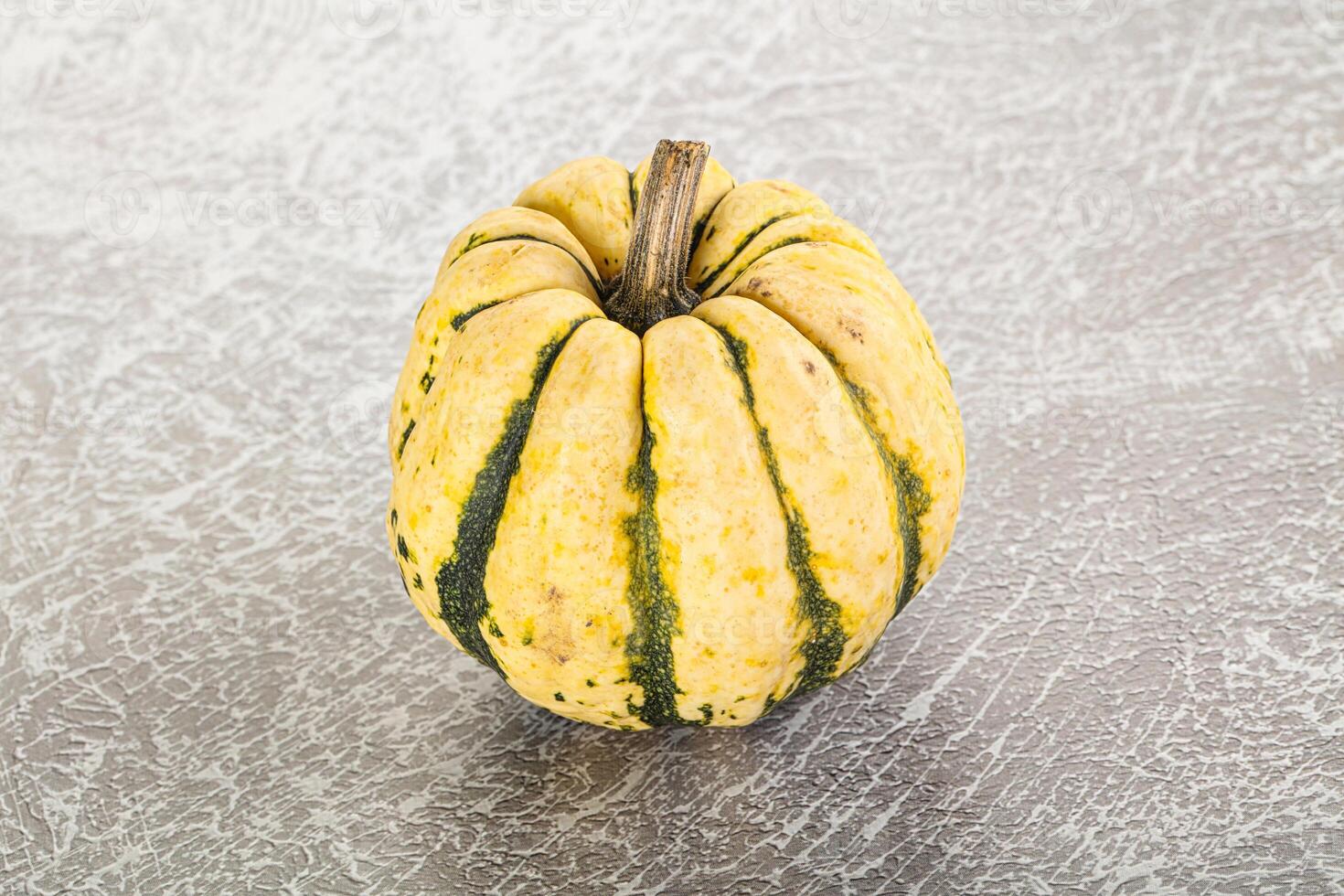 Ripe raw fresh decorative pumpkin photo