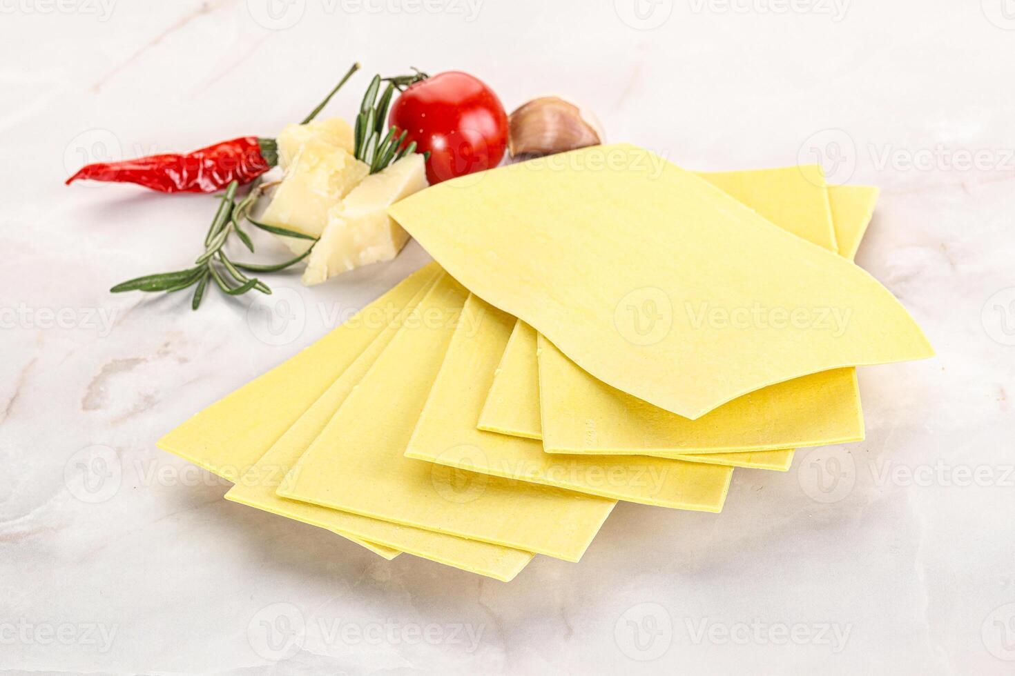 Uncooked raw Lasagna dry sheets photo