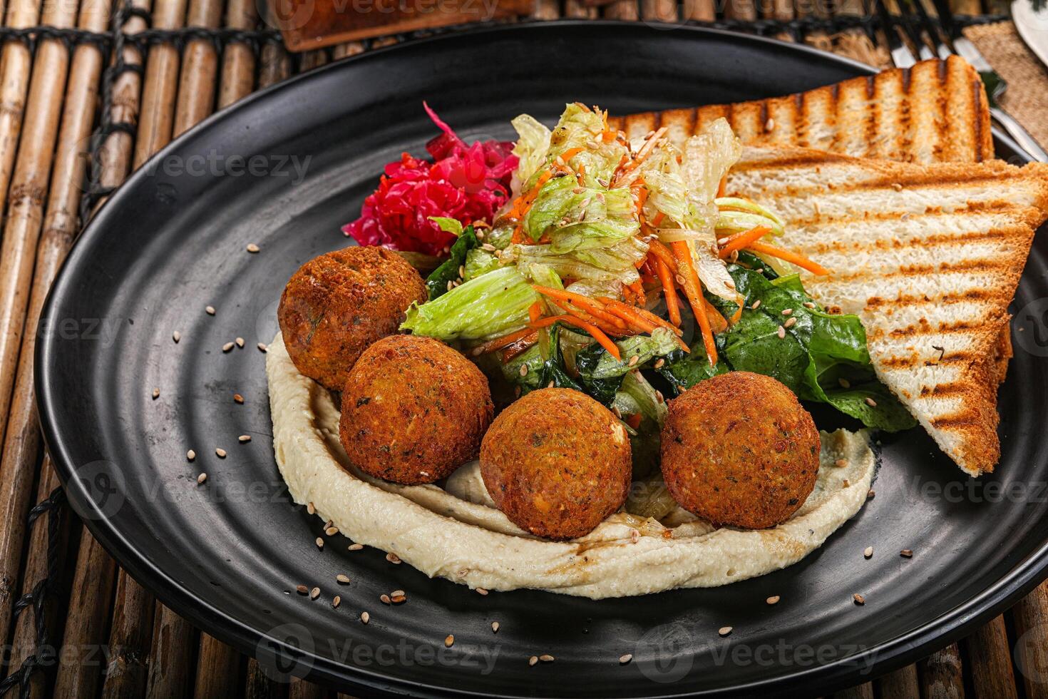 Israeli Falafel with hummus with bread photo