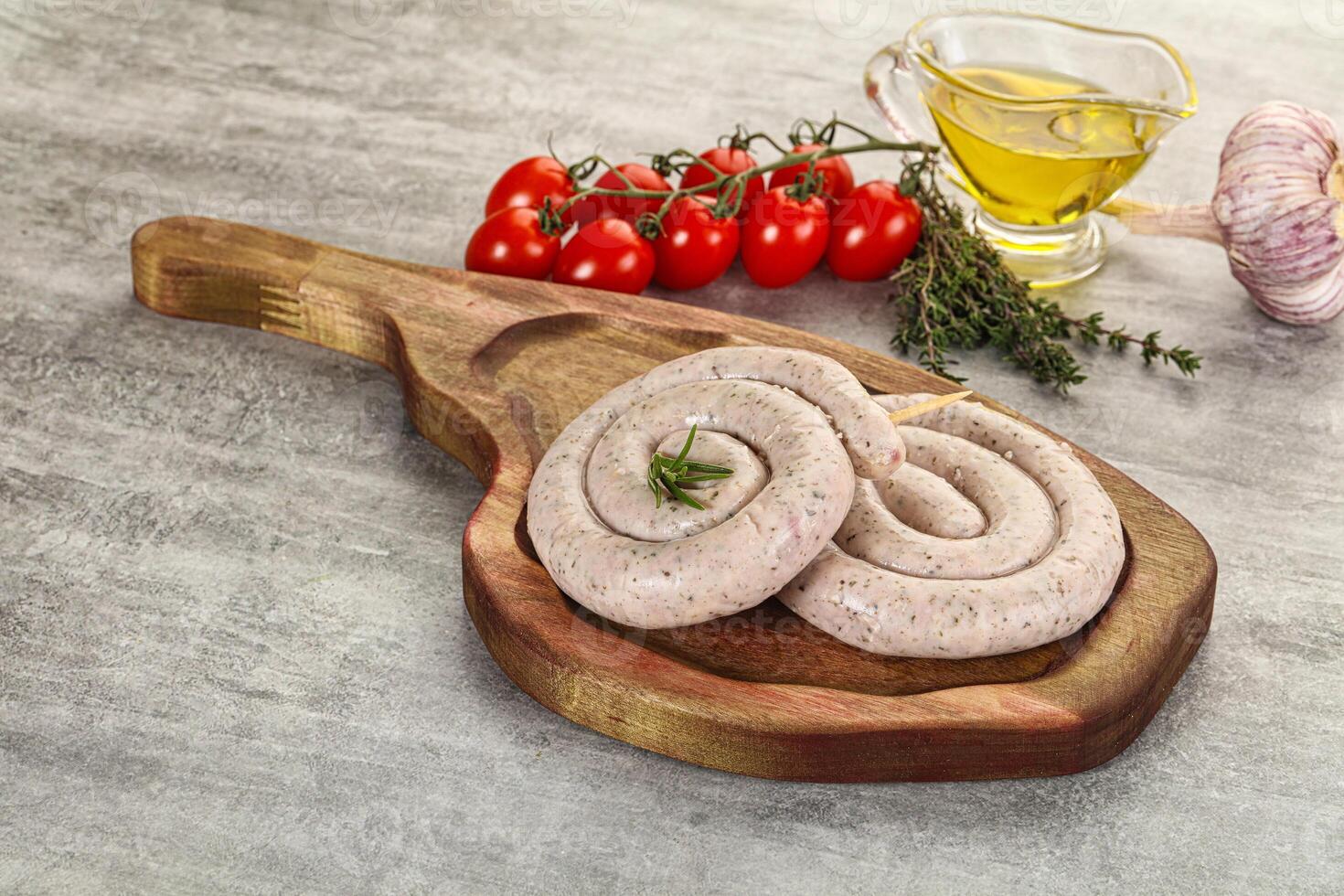 Natural spiral sausage for grill photo