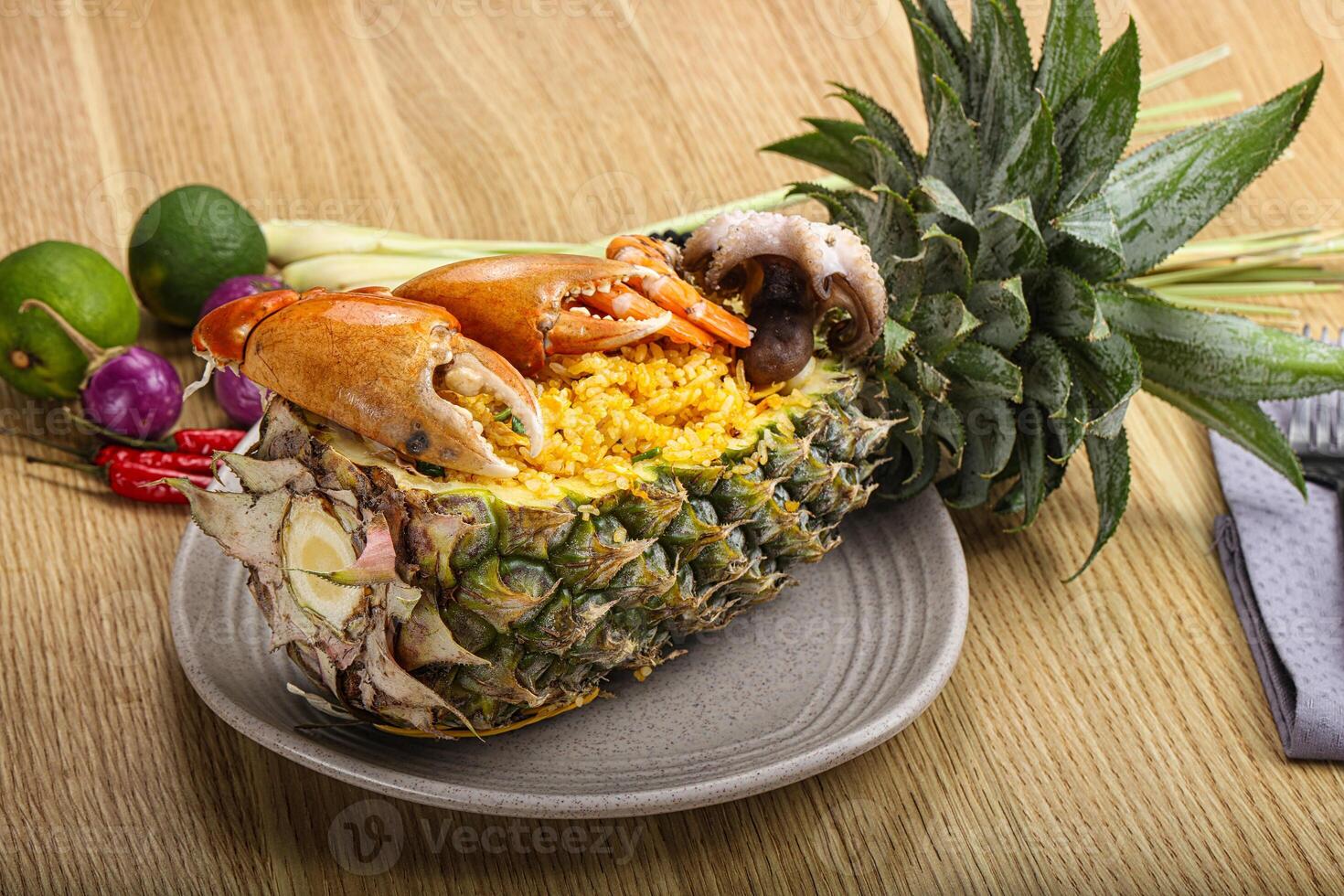 Rice with seafood in pineapple photo