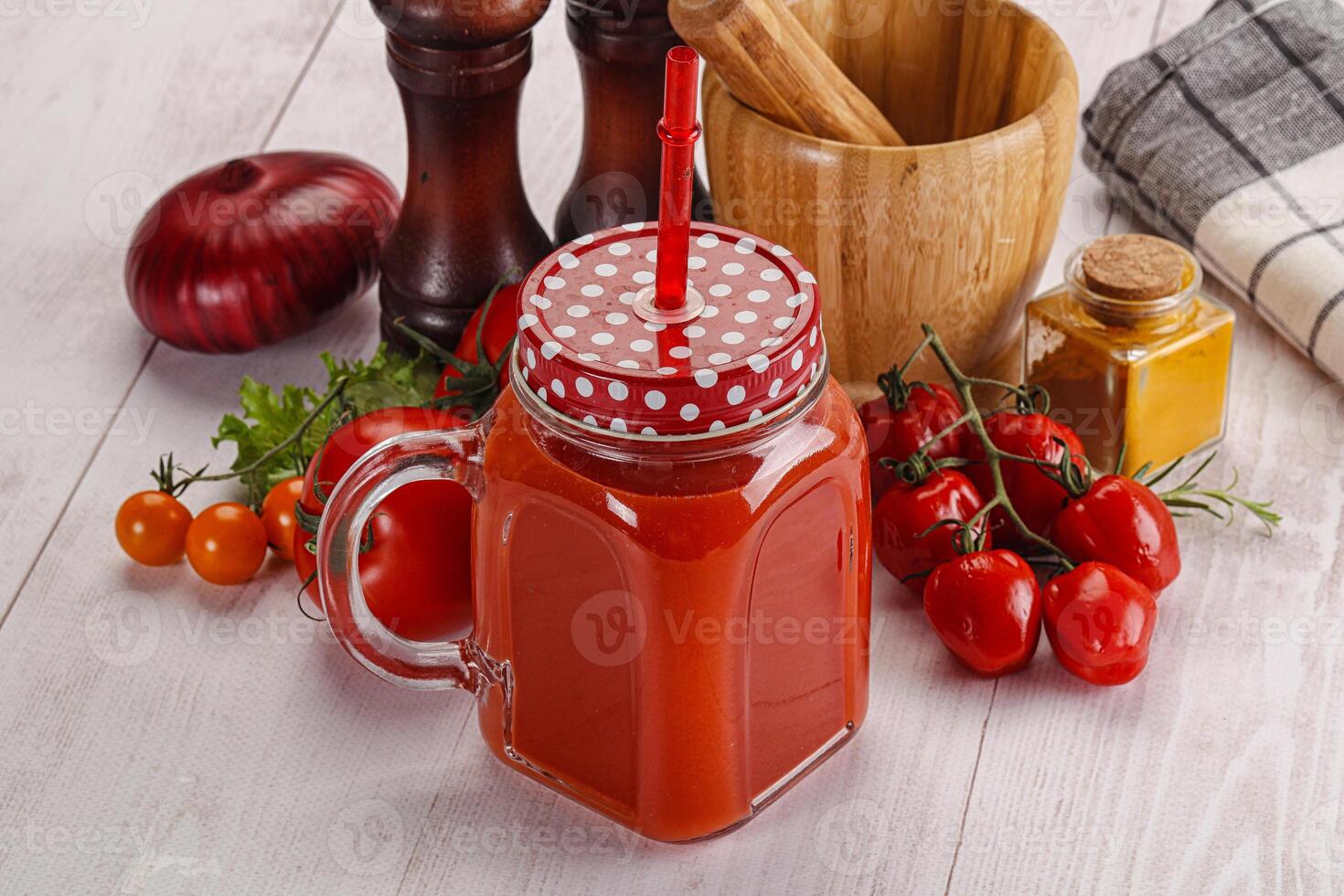 Fresh Tomato juice in the glass photo