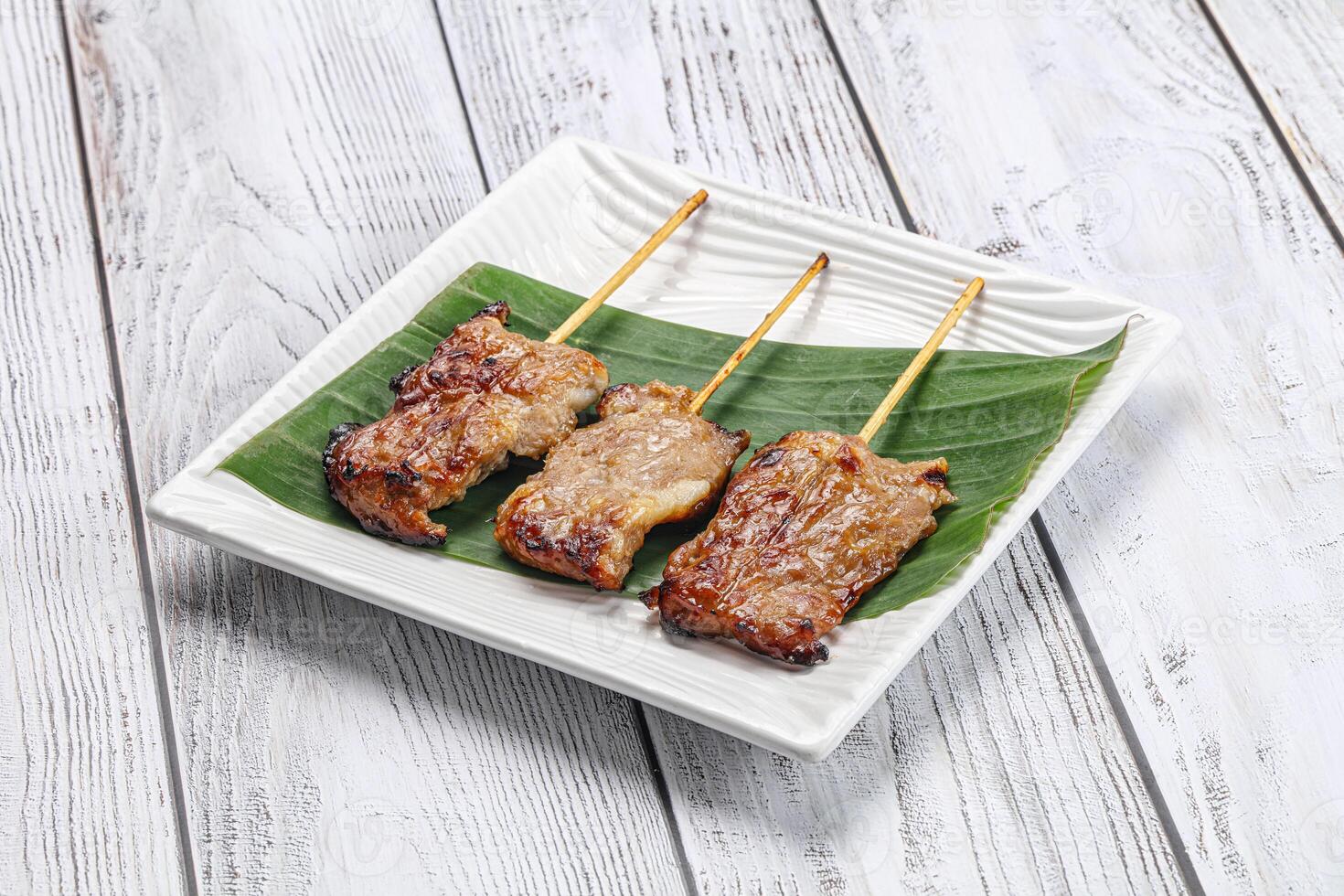 Thai cuisine - grilled pork skewer photo