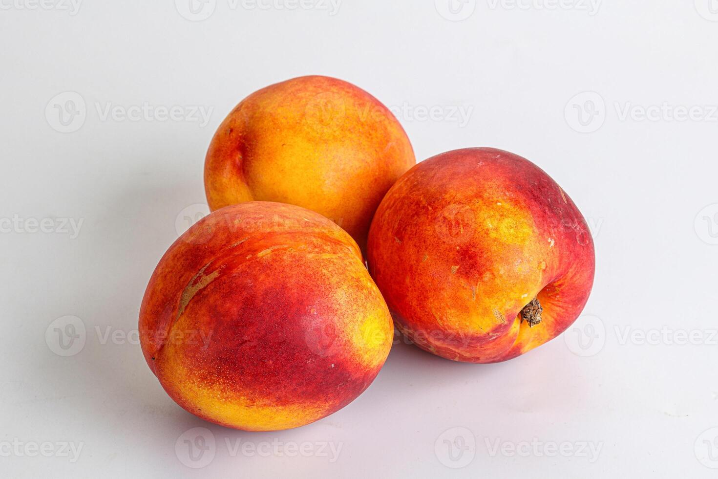 Ripe sweet juicy fresh red nectarines photo