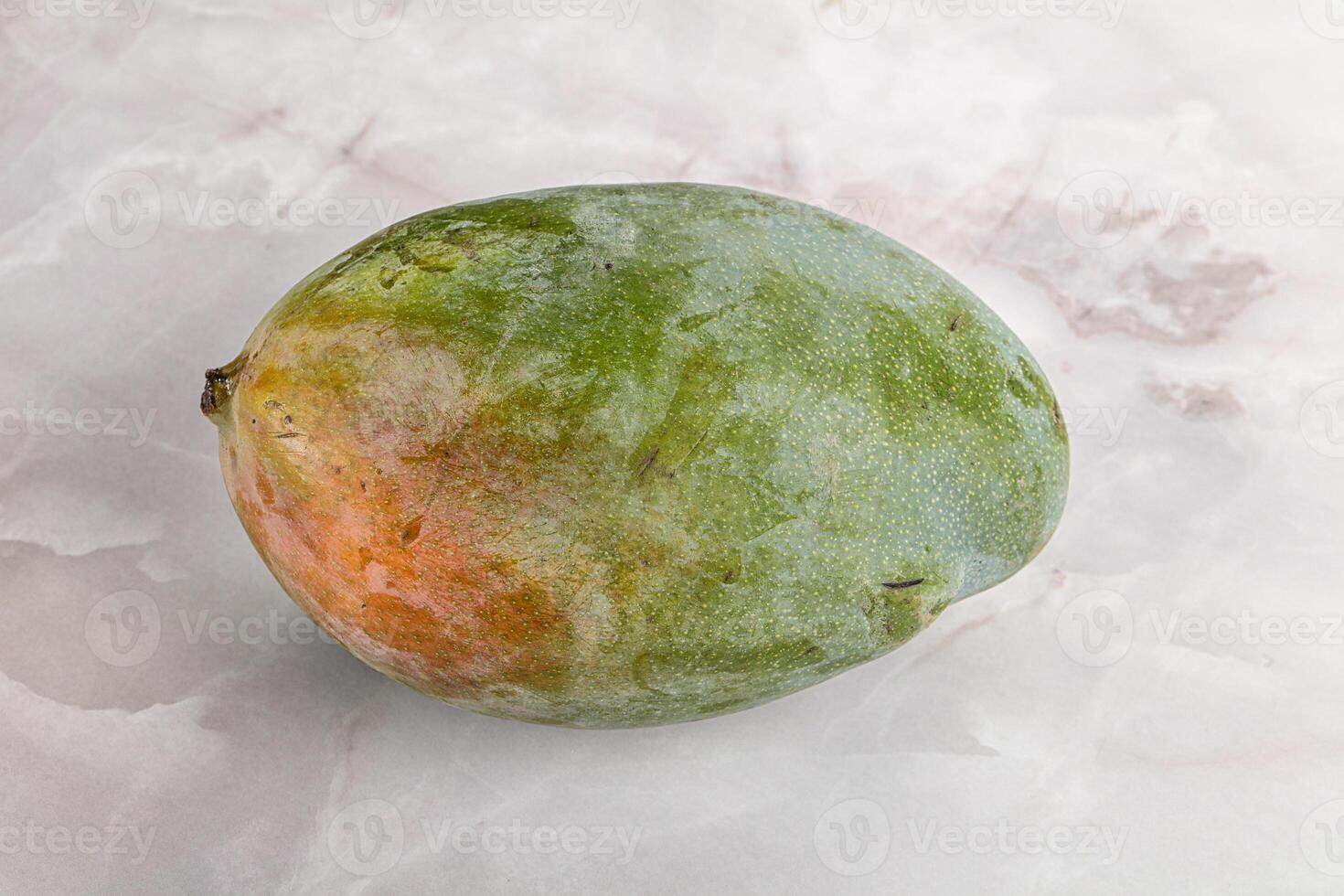Ripe sweet green tropic mango photo