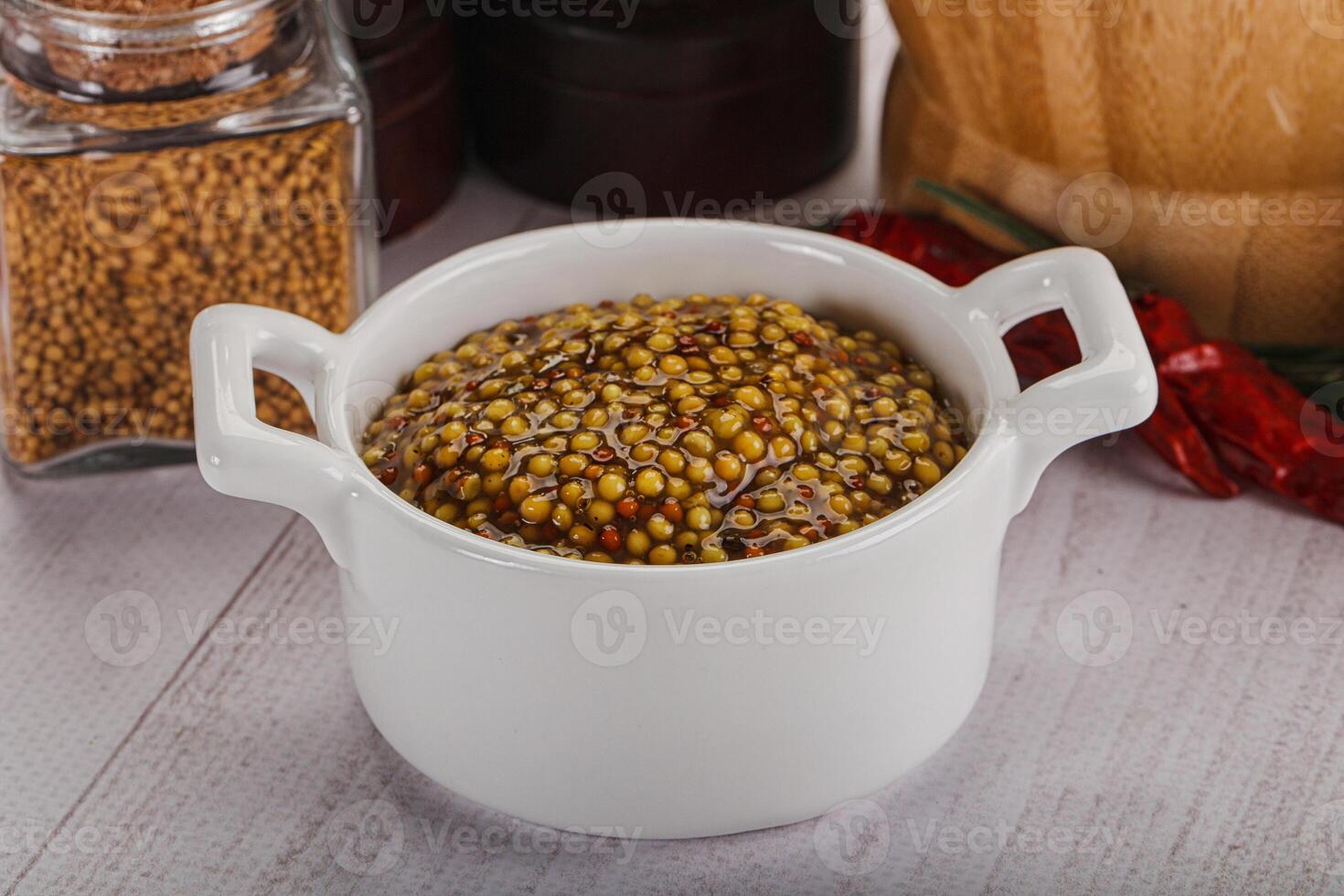 Spicy mustard sauce with seeds photo