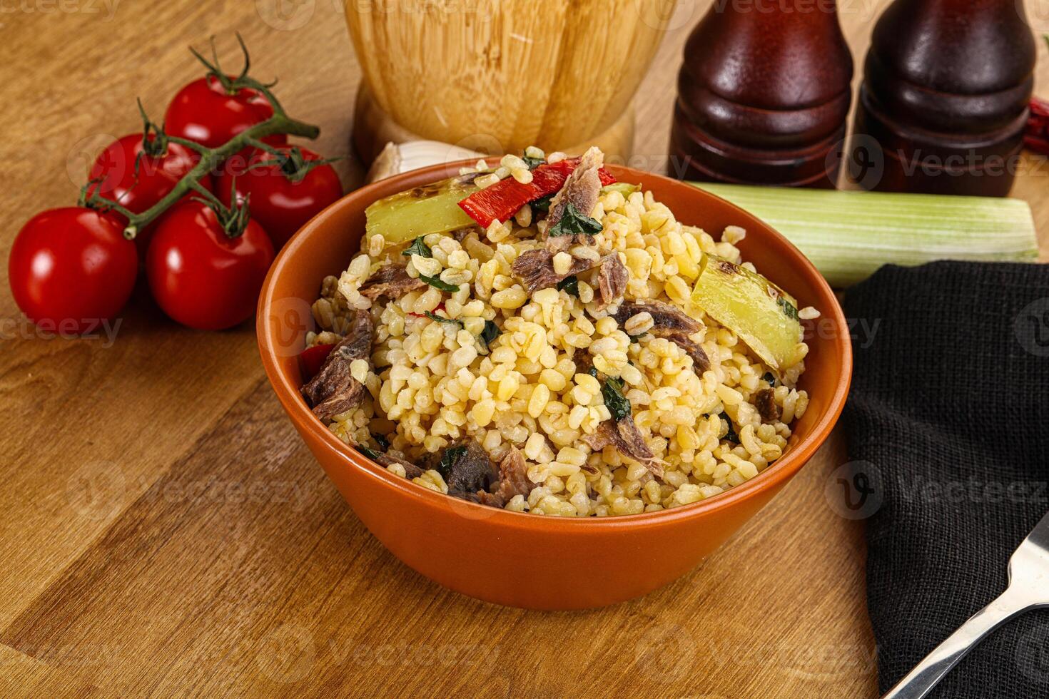 Bulgur with lamb and vegetables photo