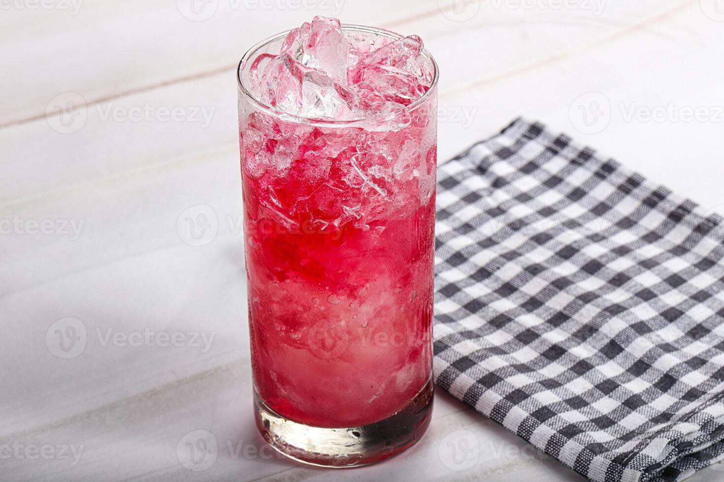Cold strawberry cocktail with ice photo