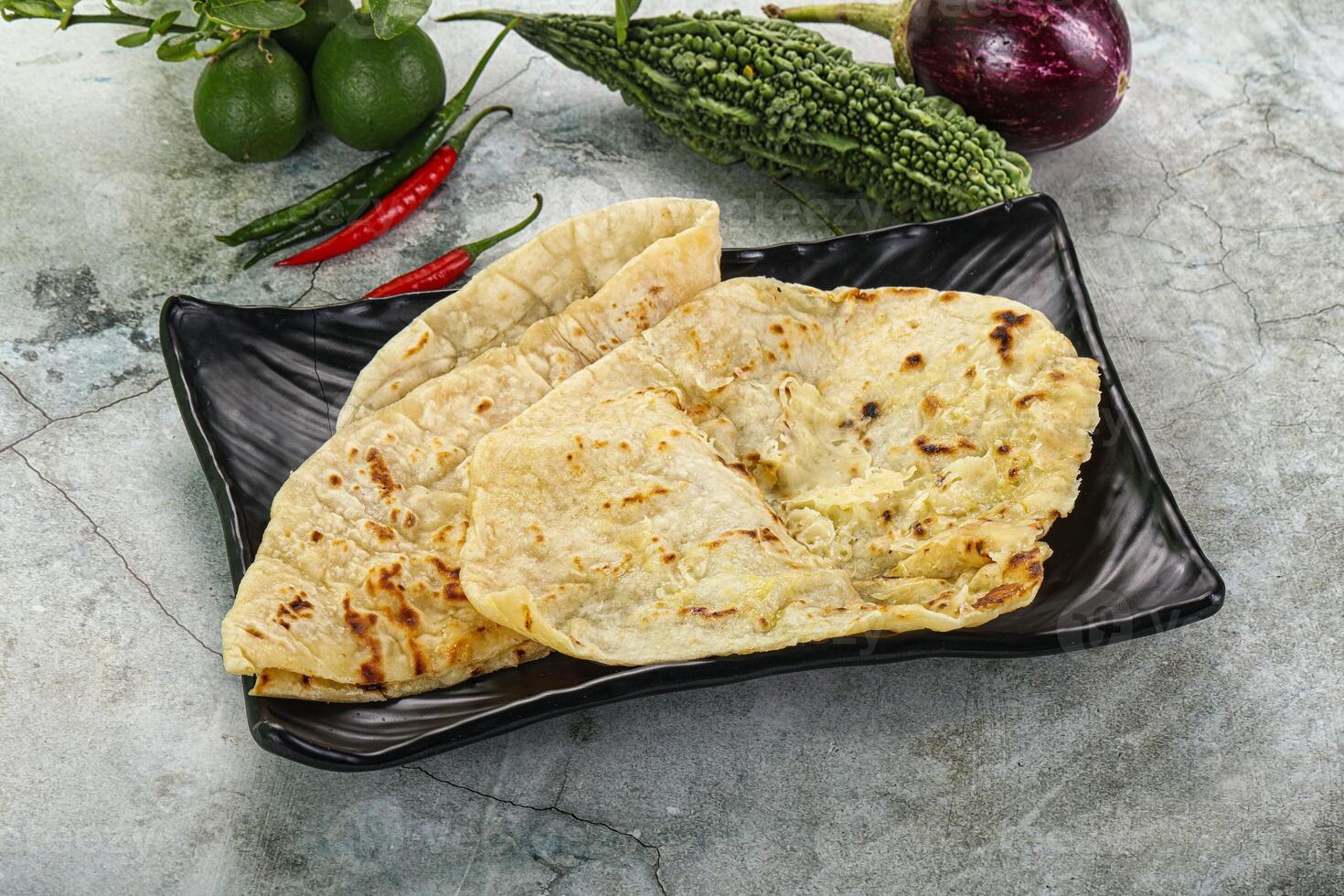 Indian tandori bread - naan with cheese photo