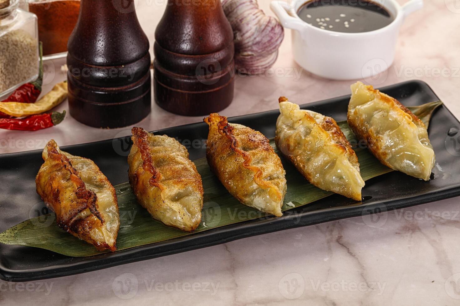 Fried Japanese stuffed dumplings - Gyoza photo