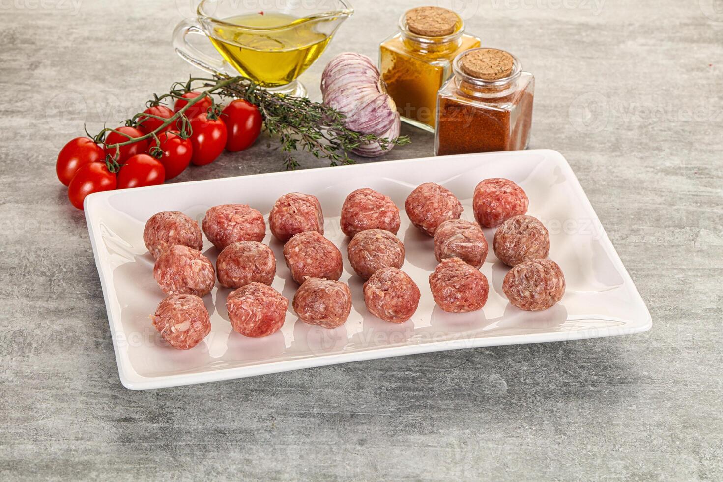 Uncooked raw beef meatball minced photo