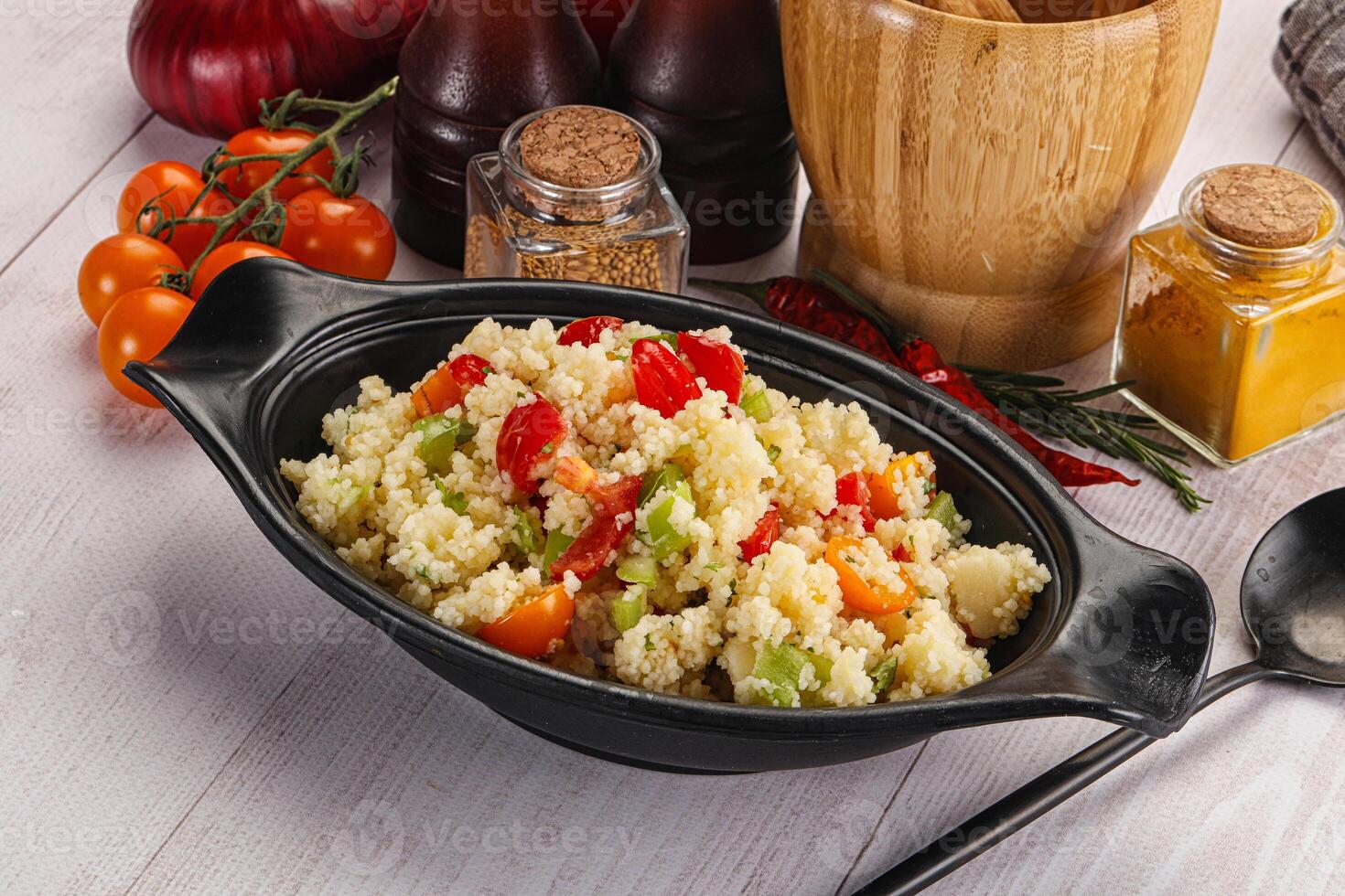 Vegan cuisine couscous with vegetables photo