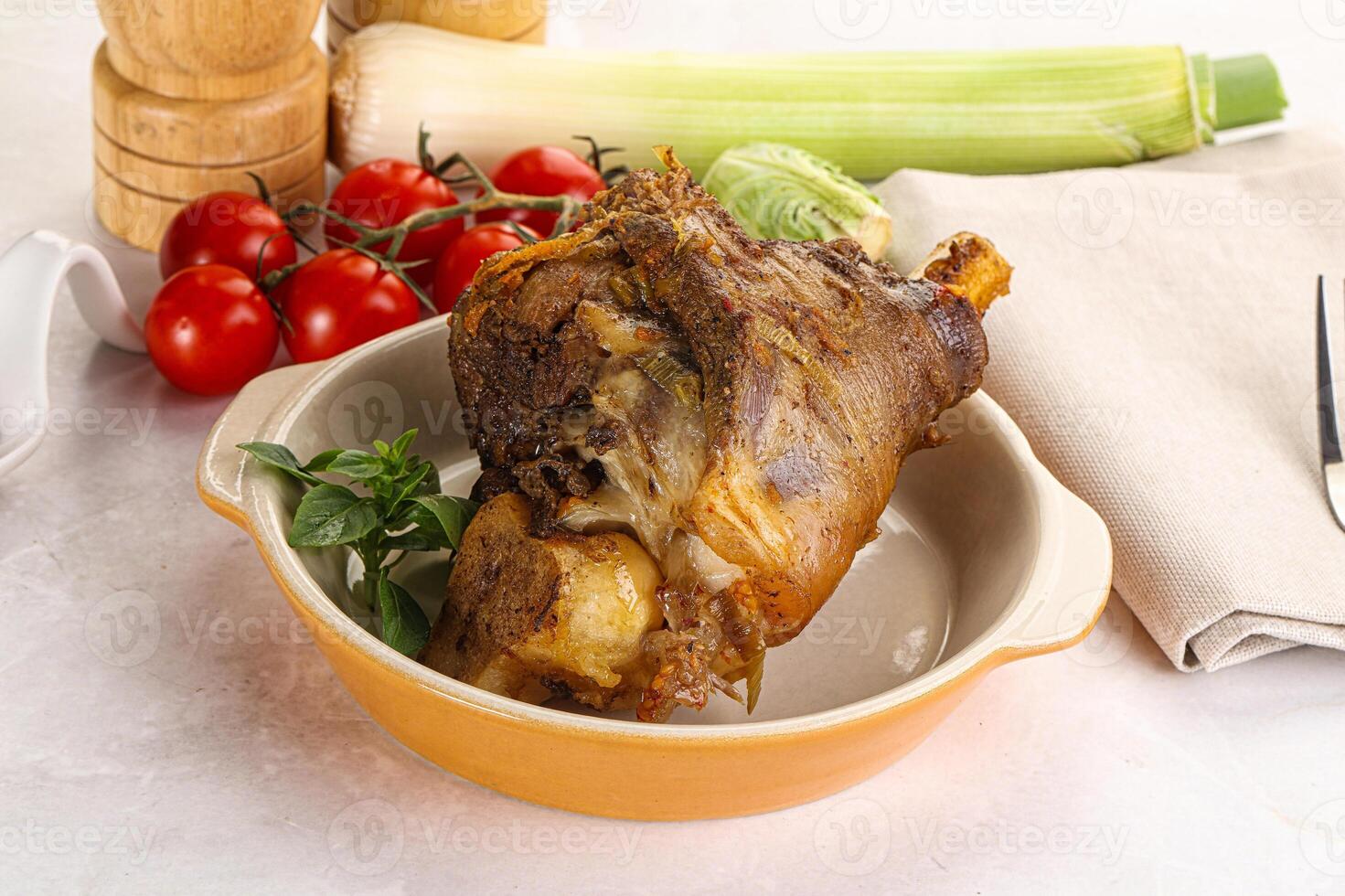 Baked Lamb shank with bone photo