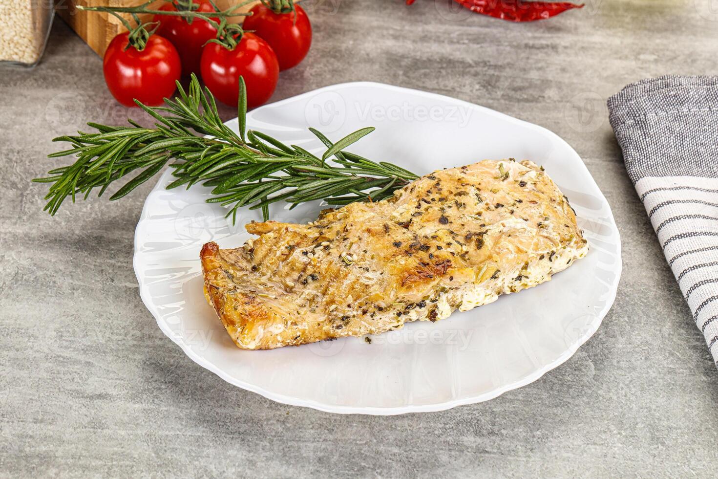 Baked salmon fish served rosemary photo