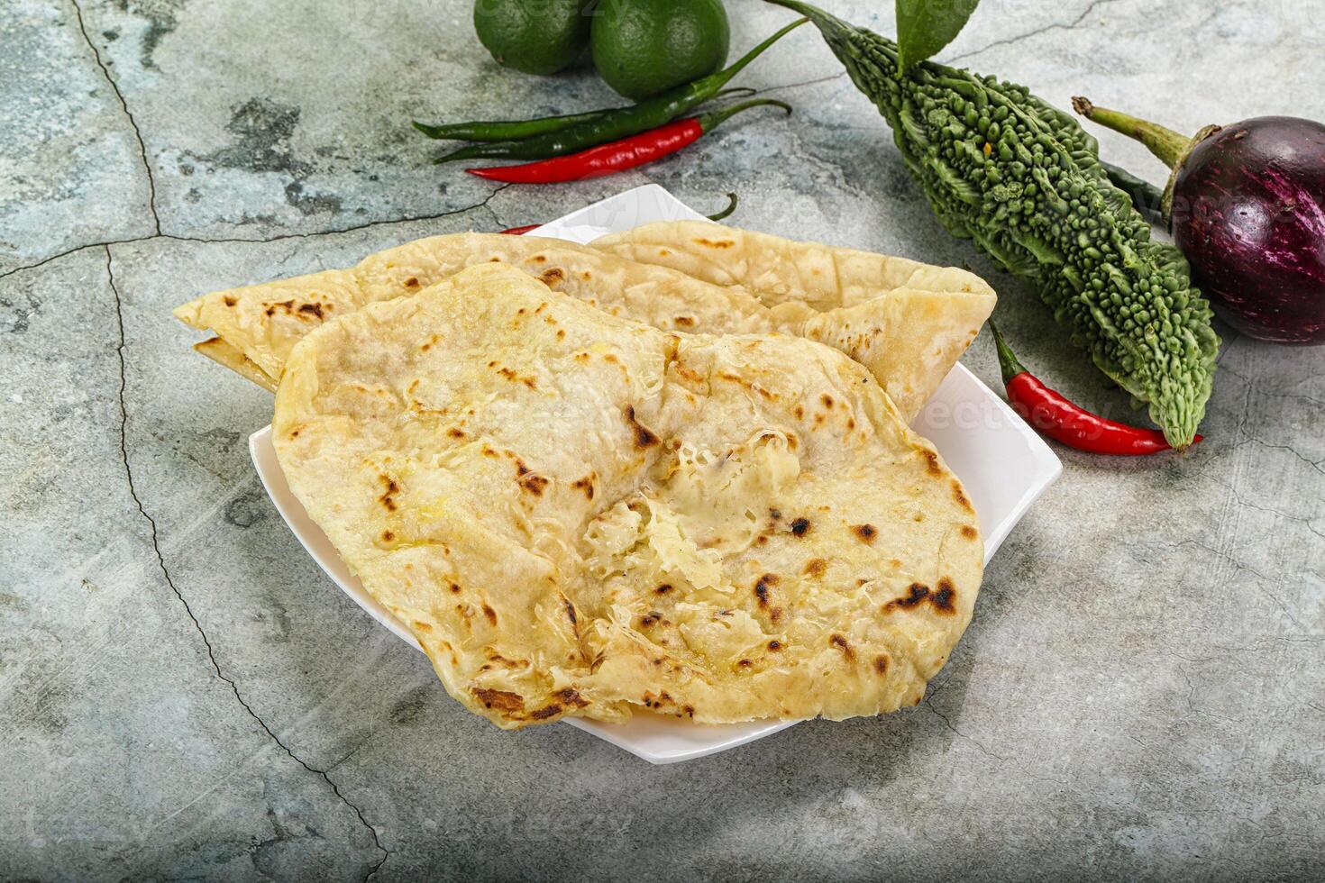 Indian tandori bread - naan with cheese photo