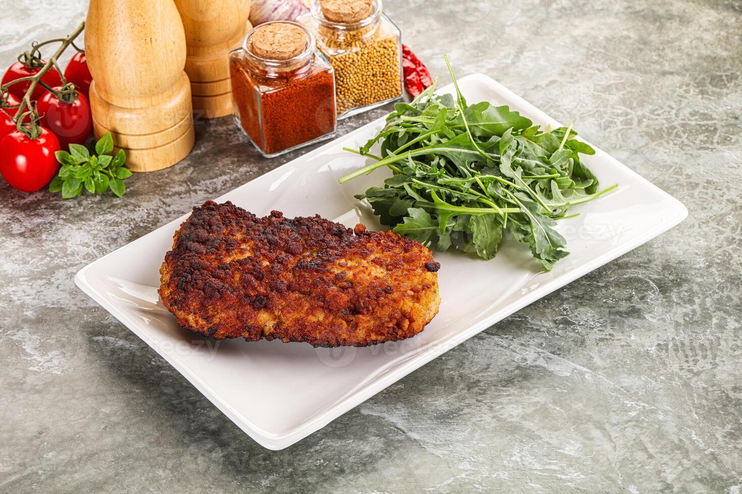 Tasty roasted breaded meat schnitzel photo