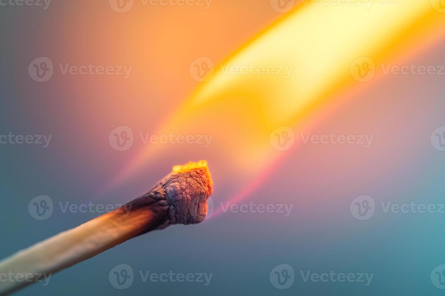 AI generated burning match close-up on a blue background photo