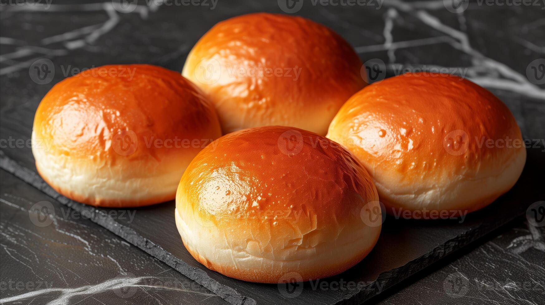 AI generated Freshly baked golden brioche buns on dark textured background photo