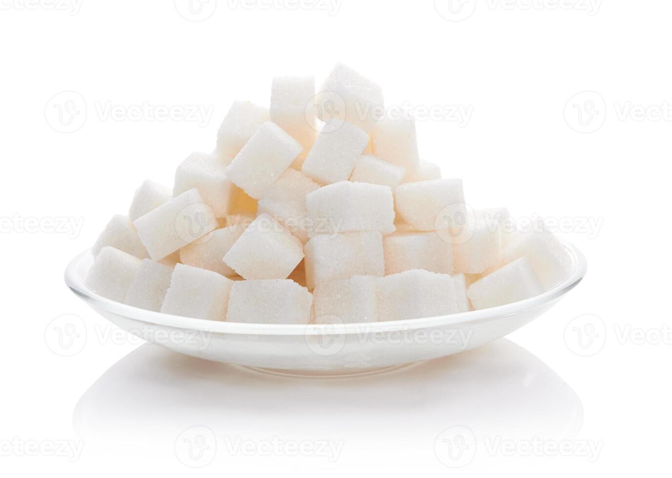 Sugar cubes on white photo