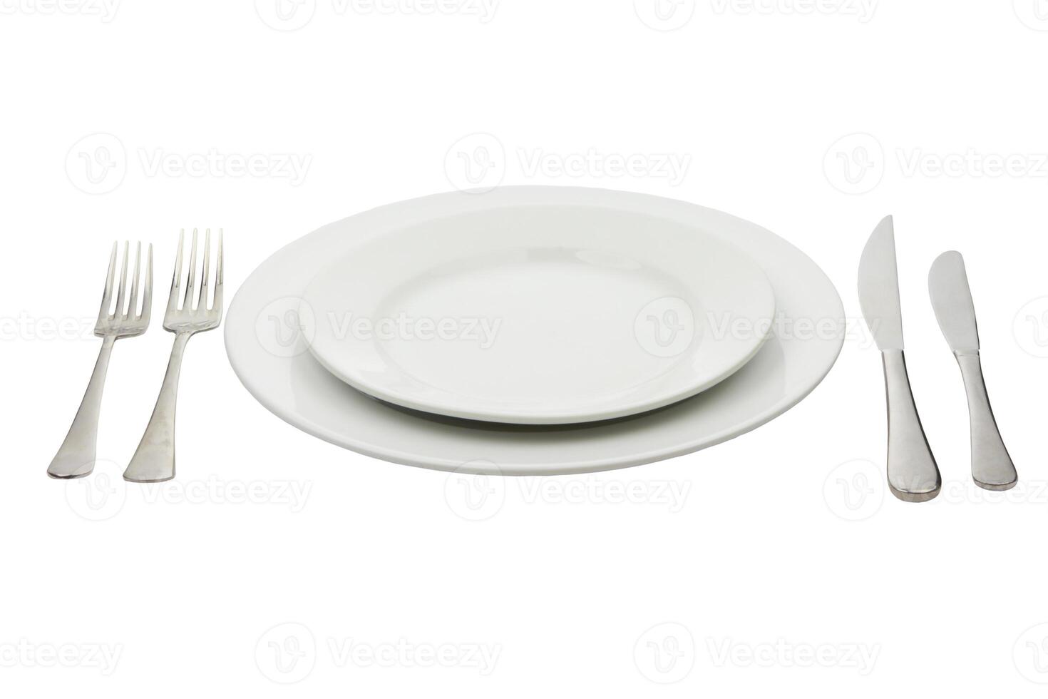 Place setting with high-gloss plate, knife fork photo