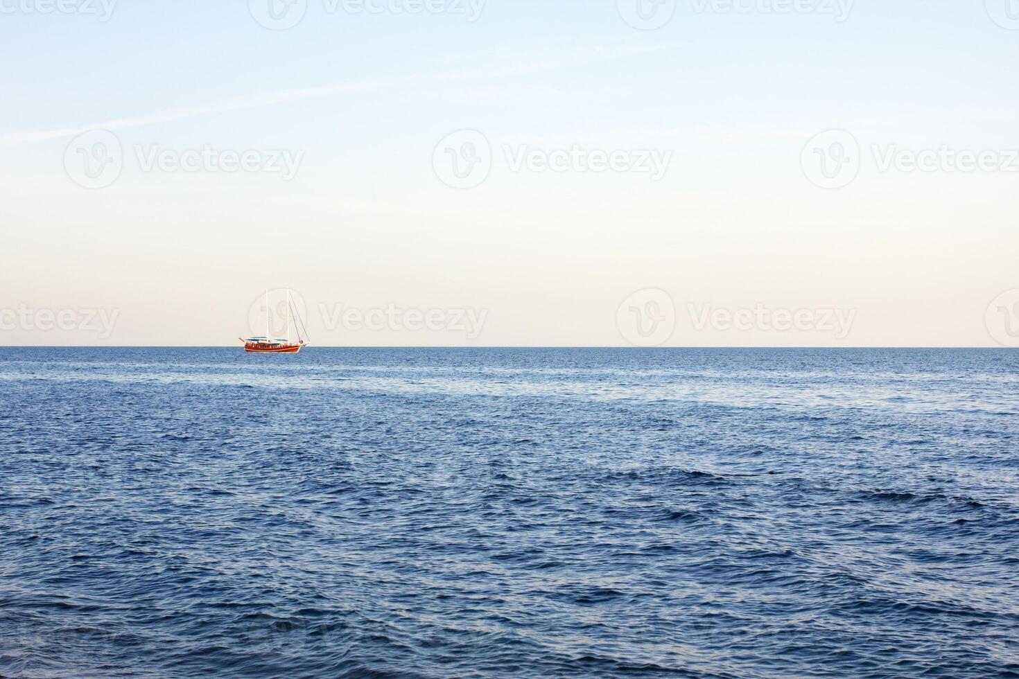 Tourist boat on sea photo