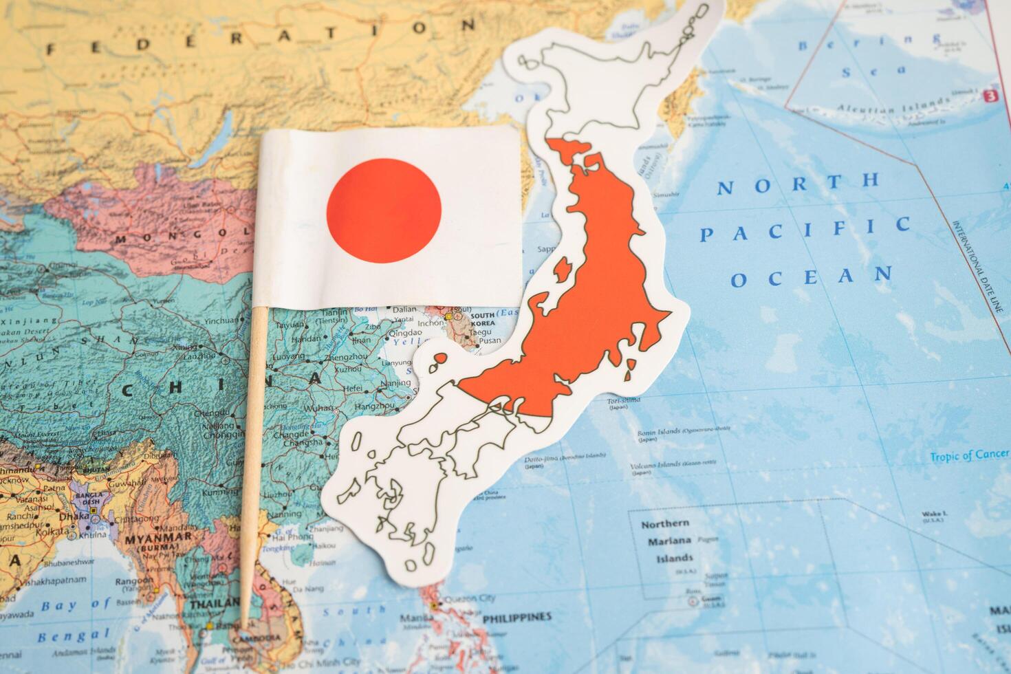 Bangkok, Thailand December 7, 2023, Japan flag on world map background. photo