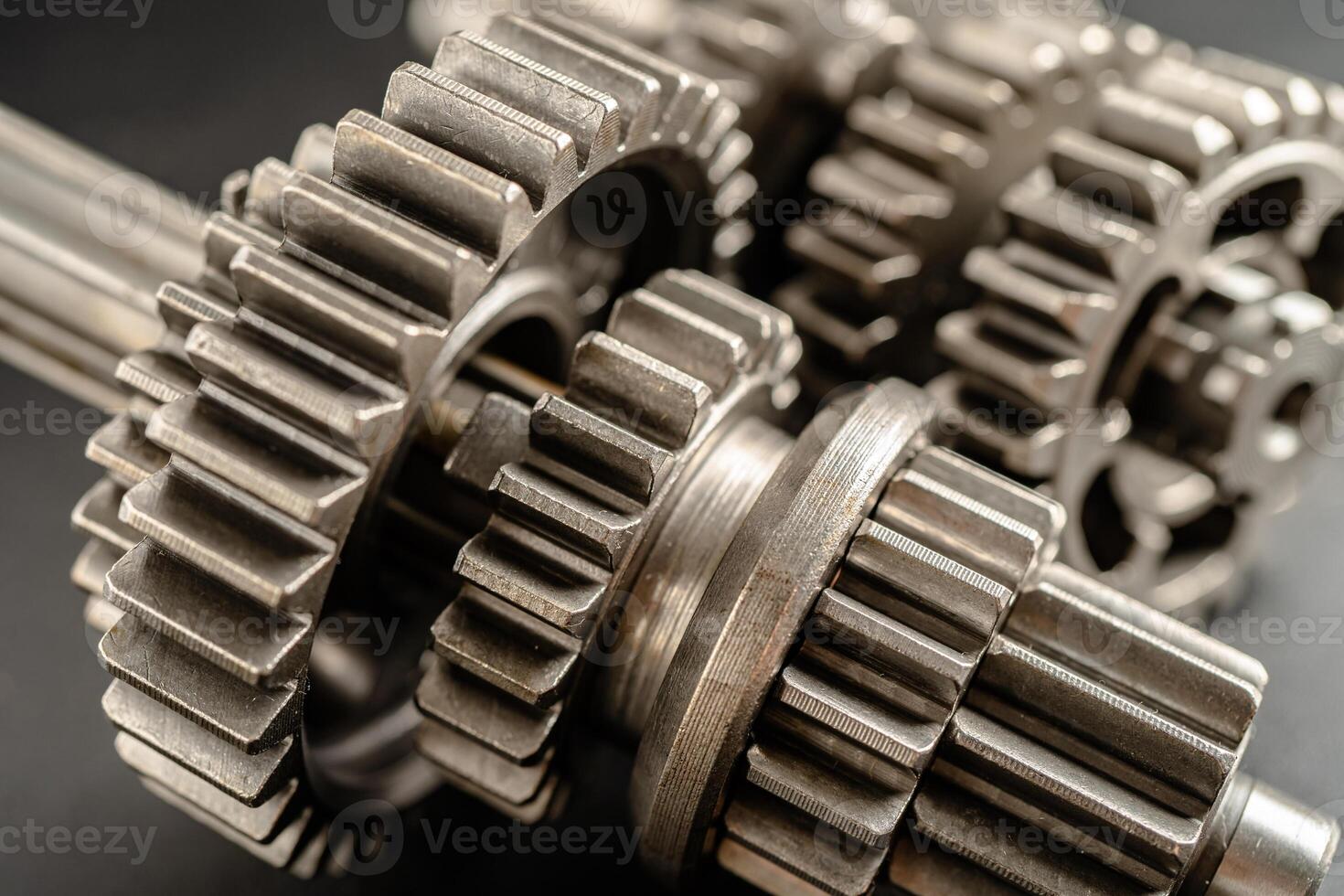 Gear and cogs wheels, clock mechanism, brass metal engine industrial. photo