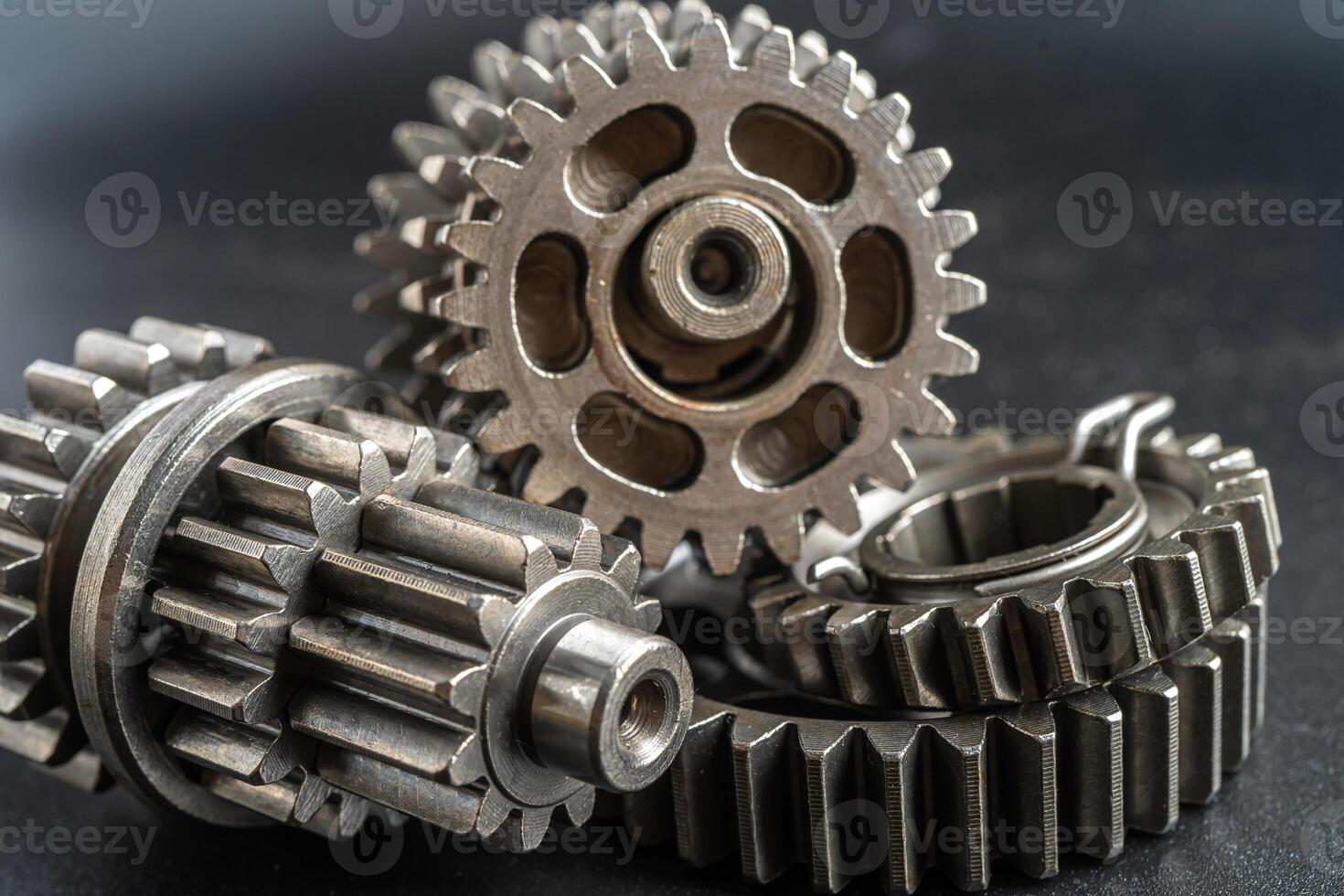 Gear and cogs wheels, clock mechanism, brass metal engine industrial. photo