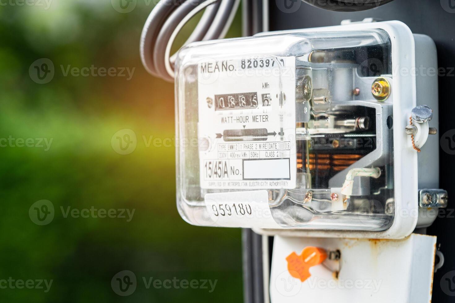 Electric measuring power meter for energy cost at home and office, solar cell concept. photo