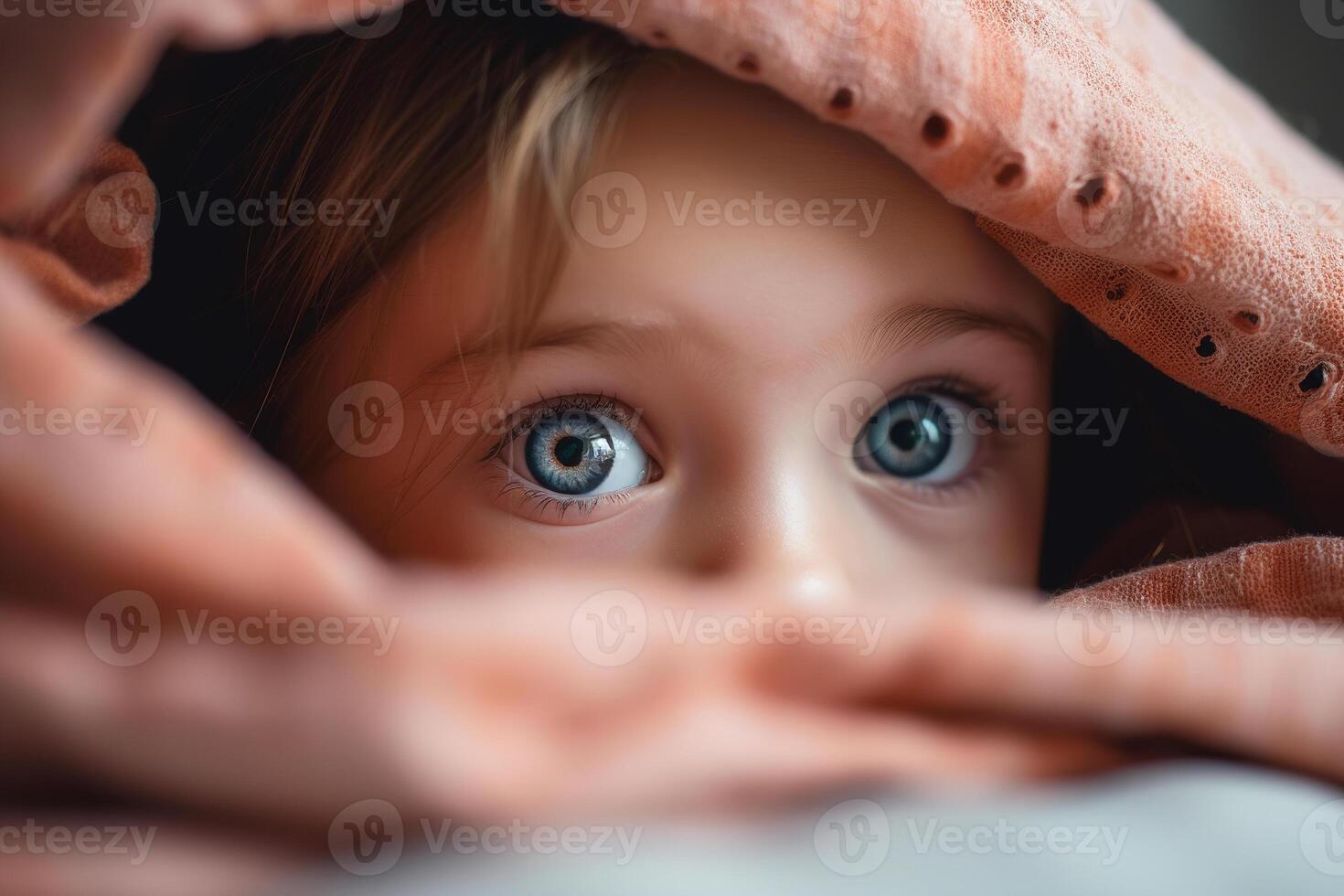 ai generado de cerca de un del bebe ojo, linda pequeño caucásico niño niña echar un vistazo fuera desde debajo cobija foto