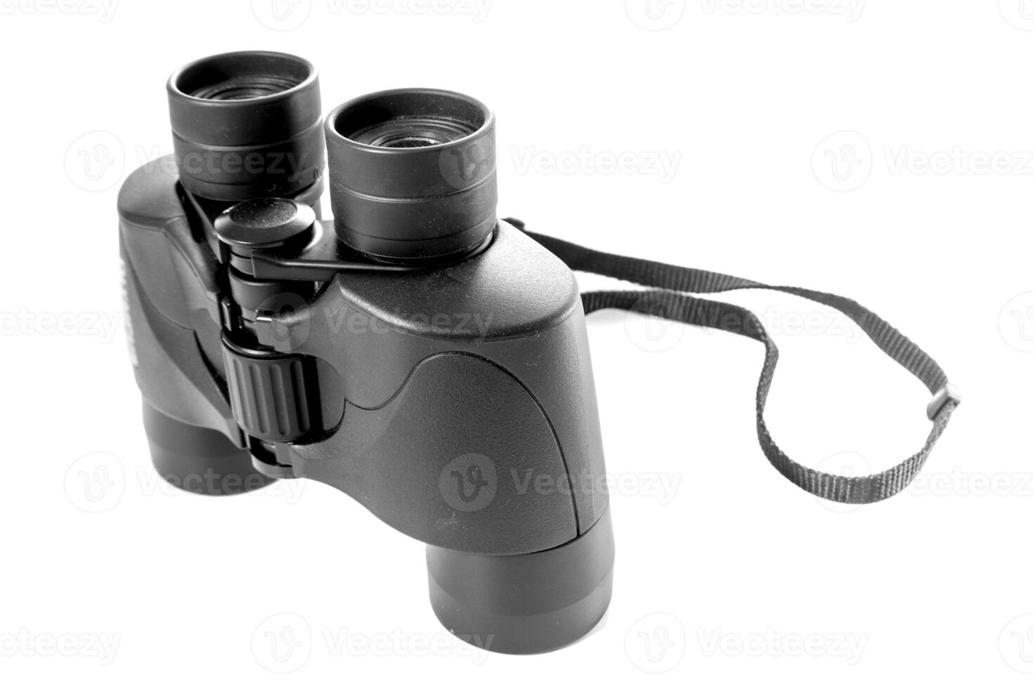 Black binocular on white background photo